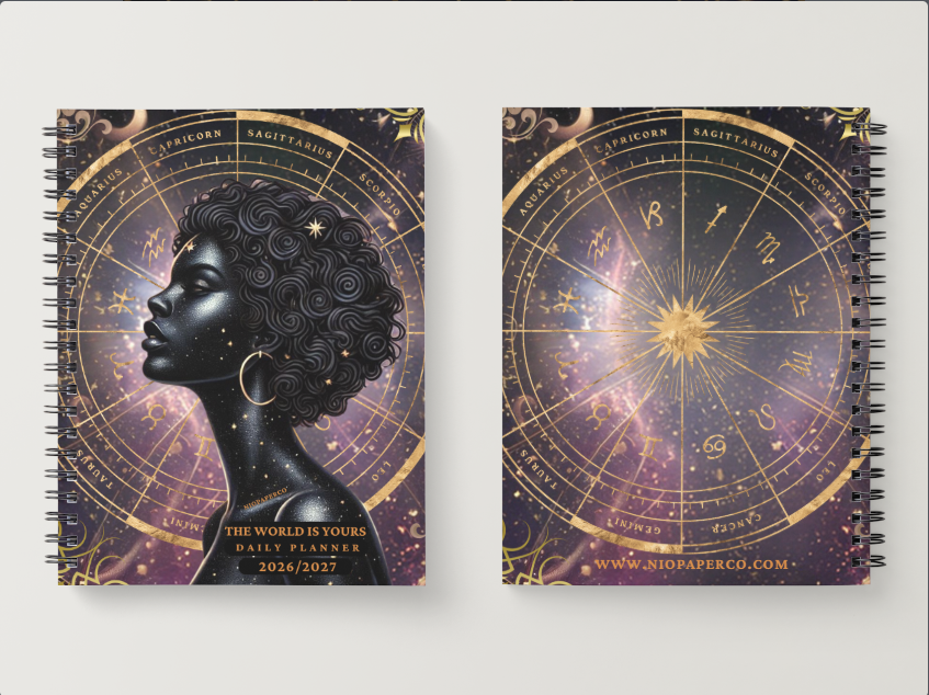 Two spiral-bound Niopaper planners with zodiac designs on a white background
