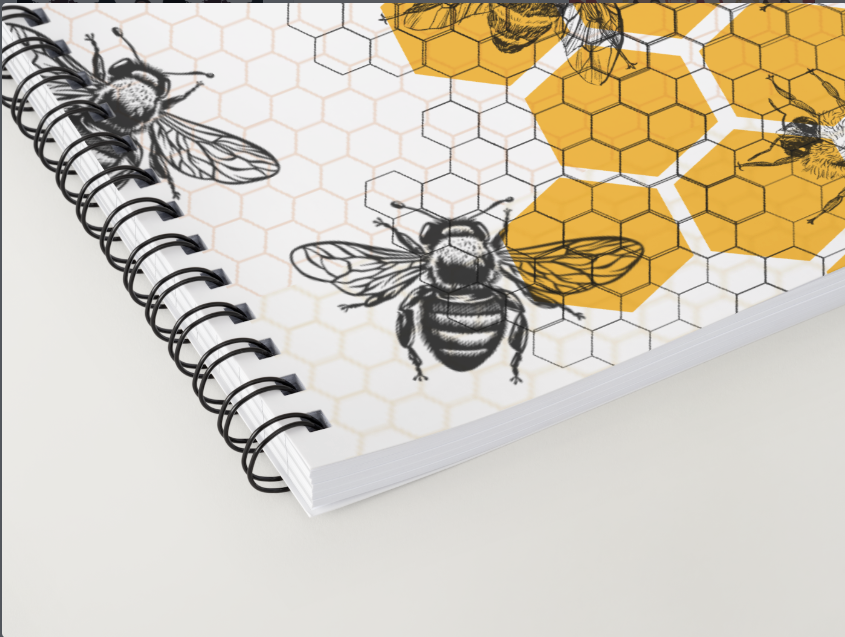 Niopaper Notebook with bee and honeycomb design on a white background