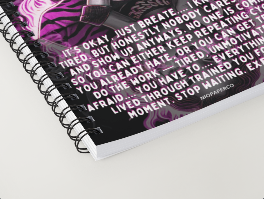 Niopaperco Notebook with motivational text and purple design on a white surface
